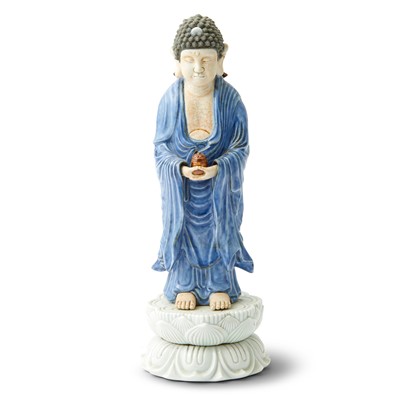 Lot 180 - A Japanese Enameled Porcelain Figure of Shakyamuni