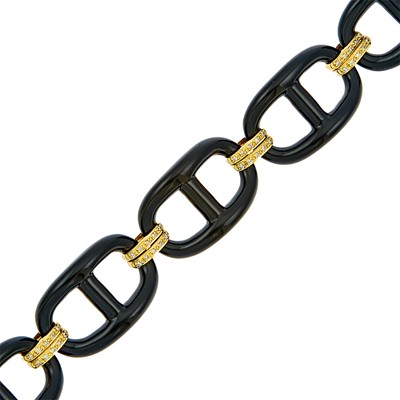 Lot 1043 - Black Onyx Nautical Link, Gold and Diamond Bracelet
