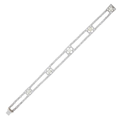 Lot 1183 - Belle Epoque Double Strand Platinum, Button Pearl and Diamond Bracelet