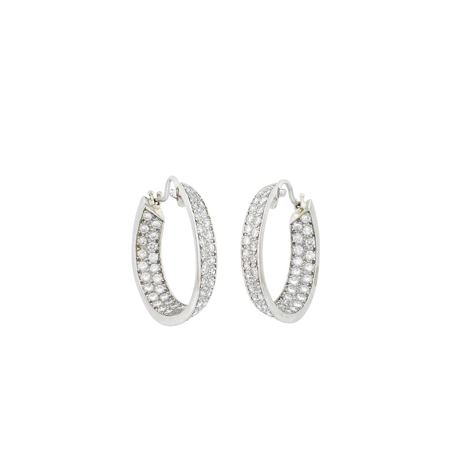 Lot 1167 - Oscar Heyman Brothers Pair of Platinum and Diamond Hoop Earrings