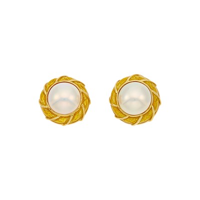 Lot 1240 - Tiffany & Co. Pair of Gold, Mabé Pearl and Yellow Enamel Earclips
