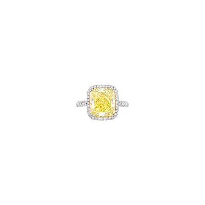 Lot 136 - Platinum, Fancy Intense Yellow Diamond and Diamond Ring