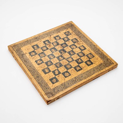Lot 382 - A Victorian printed chessboard, with Classical yet cartoonish designs