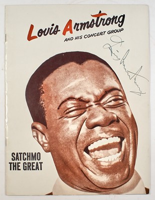 Lot A concert program signed by Louis Armstrong