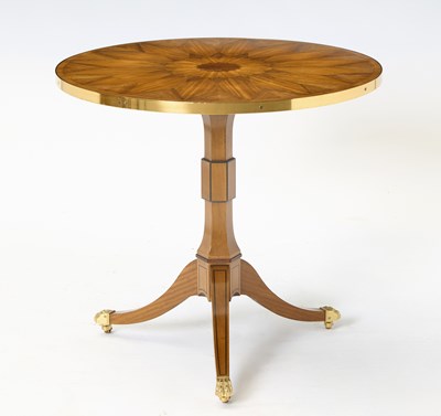 Lot 395 - Regency Style Part-Ebonized and Brass-Mounted Mahogany Circular Side Table
