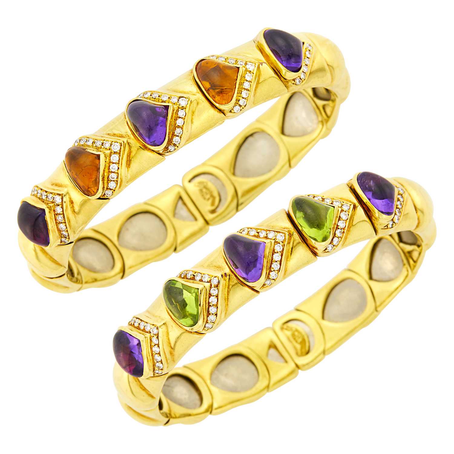Lot 1140 - Pair of Gold, Cabochon Gem-Set and Diamond Bracelets