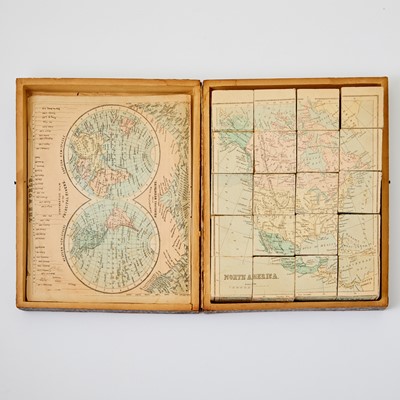 Lot 406 - A block puzzle with maps of Europe, England, Ireland, Scotland, America and the World