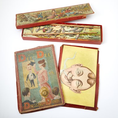 Lot 438 - A group of two antique nineteenth-century American boxed games with amusing graphics