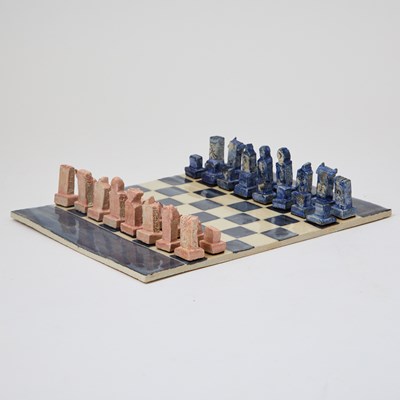 Lot 311 - A handmade ceramic chess set with pieces based on characters from Sondheim musicals