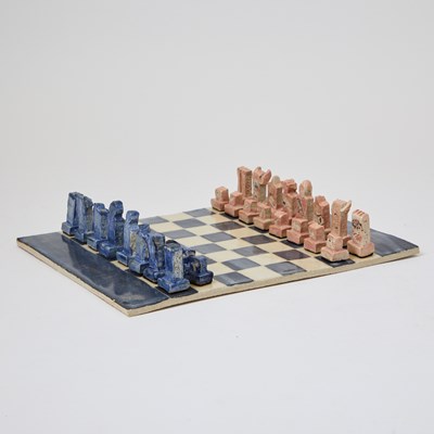 Lot 311 - A handmade ceramic chess set with pieces based on characters from Sondheim musicals