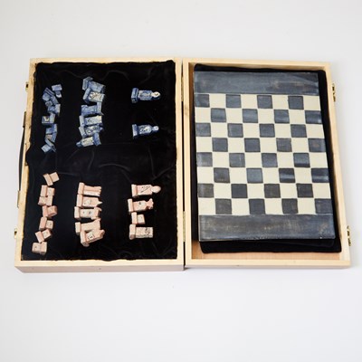 Lot 311 - A handmade ceramic chess set with pieces based on characters from Sondheim musicals