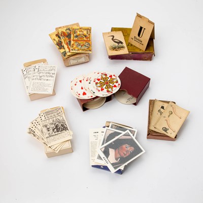 Lot 451 - A group of seven decks of cards