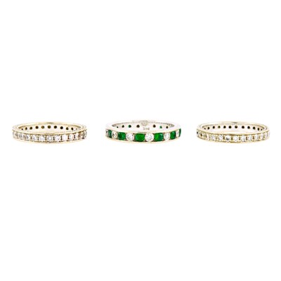 Lot 1245 - Three White Gold, Diamond and Emerald Band Rings