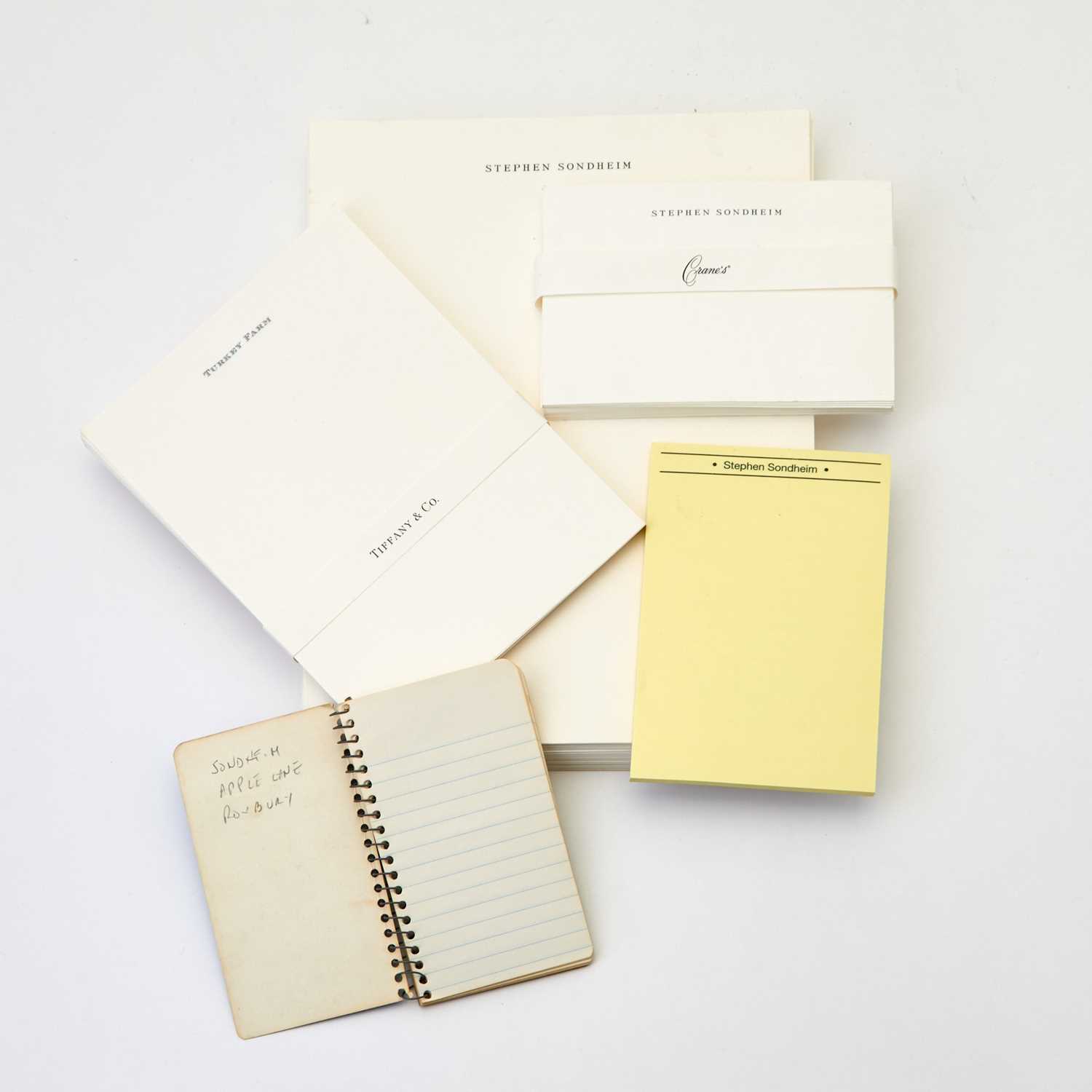 Lot 277 - A stack of Stephen Sondheim's stationery and a signed spiral notebook