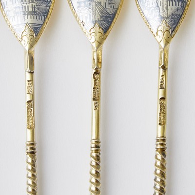 Lot 705 - Set of Twelve Russian Parcel-Gilt Silver and Niello Spoons