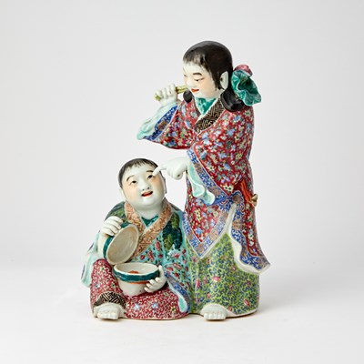 Lot 303 - A Chinese Enameled Porcelain Figure