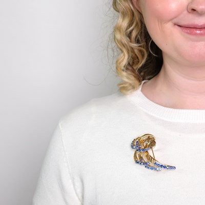 Lot 1106 - Gold, Platinum and Sapphire Clip-Brooch, France