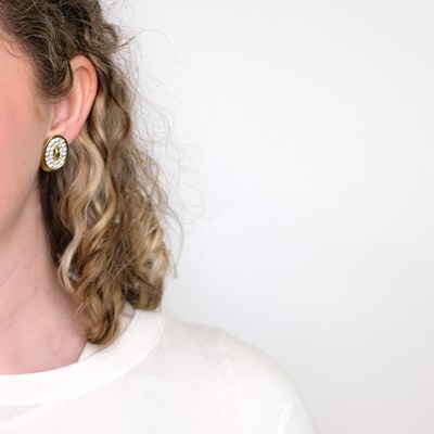 Lot 1136 - Angela Cummings Pair of Gold, Platinum and Diamond Earclips