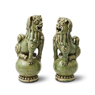 Lot 115 - A Pair of Chinese Longquan-Style Celadon Lions