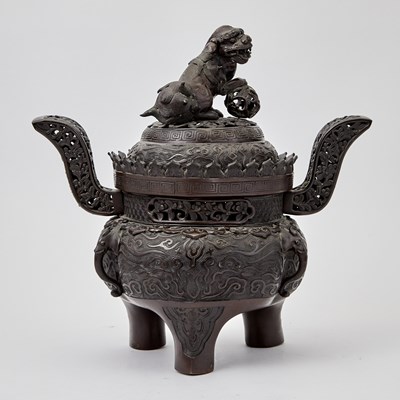 Lot 482 - A Chinese Bronze Tripod Censer and Cover