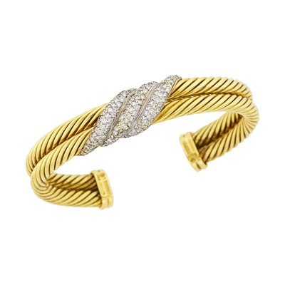 Lot 1047 - David Yurman Two-Color Fluted Gold and Diamond Bangle Bracelet