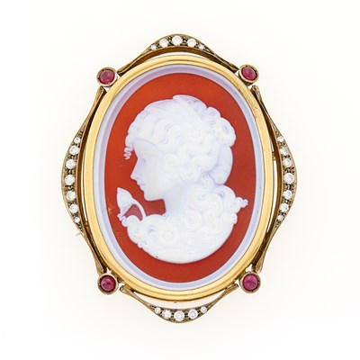 Lot 2103 - Gold, Carved Hardstone, Ruby and Diamond Cameo Brooch