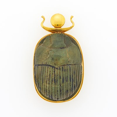 Lot 2077 - Gold and Carved Hardstone Scarab Pendant