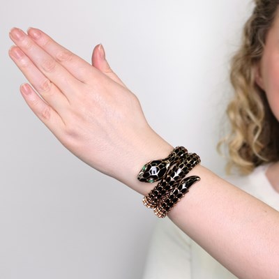Lot 1102 - Alexis Rose Gold-Plated Silver, Black Enamel and Emerald Snake Bracelet-Watch