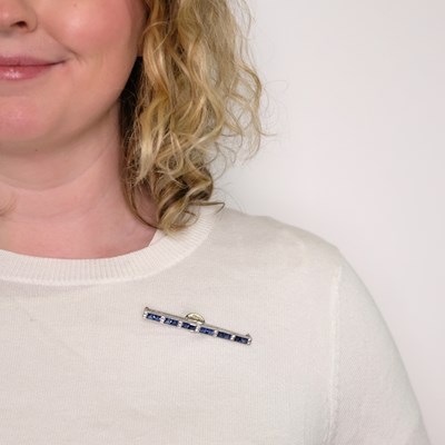 Lot 1181 - Platinum, Sapphire and Diamond Bar Pin
