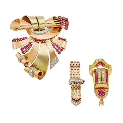 Lot 1075 - Two-Color Gold, Diamond and Ruby Brooch, Pendant and Buckle Ring