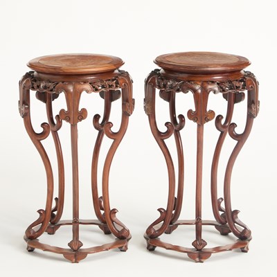 Lot 550 - A Pair of Chinese Carved Hardwood Stands