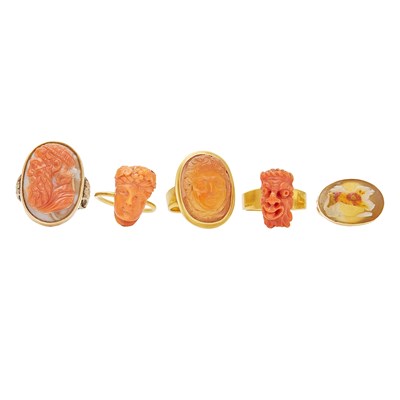 Lot 2138 - Five Gold, Gilt-Metal, Carved Coral and Hardstone Rings