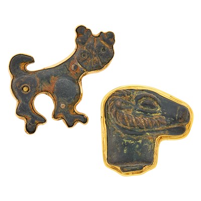 Lot 2073 - Two Gold and Carved Hardstone Brooches