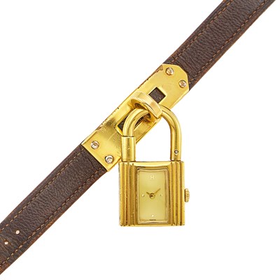 Lot 1268 - Hermès Gilt-Metal 'Kelly' Charm Bracelet-Watch