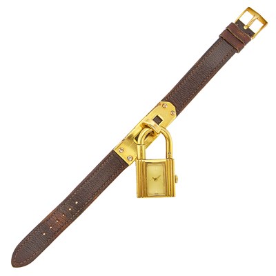 Lot 1268 - Hermès Gilt-Metal 'Kelly' Charm Bracelet-Watch
