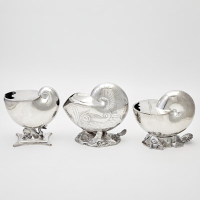 Lot 658 - Three Victorian Silver Plated Shell-Form Spoon Warmers