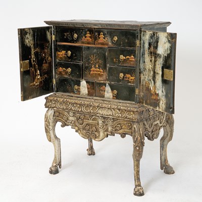 Lot 184 - Black Lacquer Chinoiserie Decorated Cabinet on Carved Wood Stand