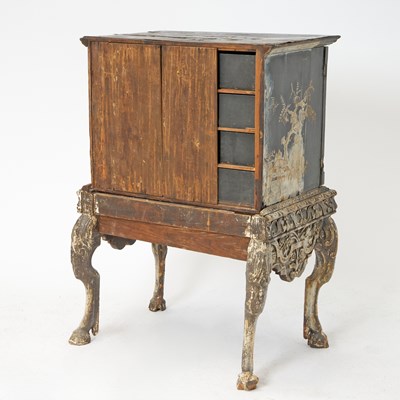 Lot 184 - Black Lacquer Chinoiserie Decorated Cabinet on Carved Wood Stand