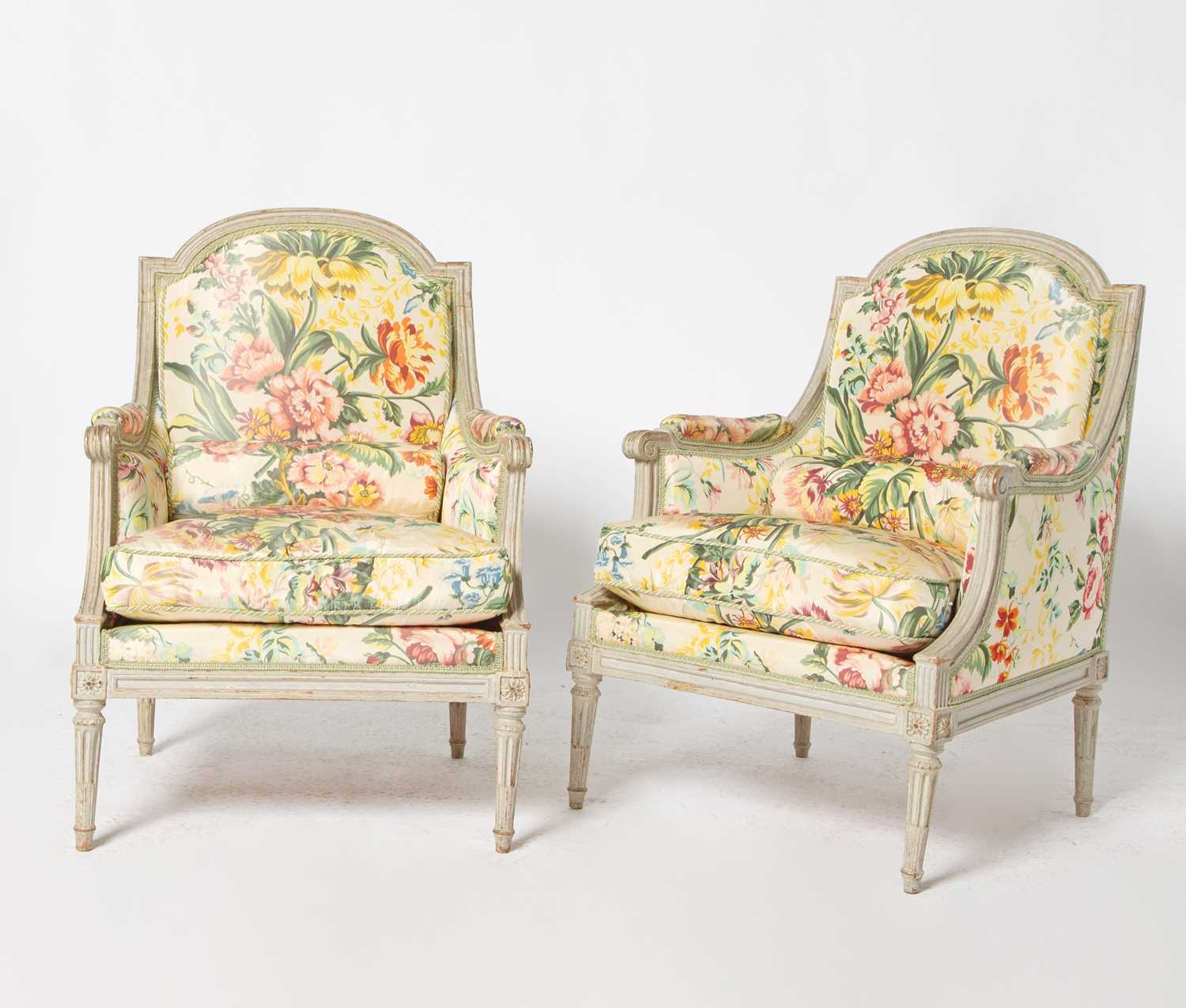 Lot 439 - Pair of Louis XVI Painted Bergères, probably by Claude Chevigny