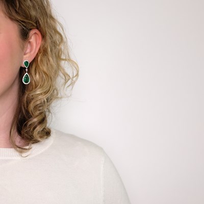 Lot 1159 - Pair of White Gold, Emerald and Diamond Pendant-Earrings