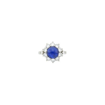 Lot 103 - Platinum, Cabochon Sapphire and Diamond Ring