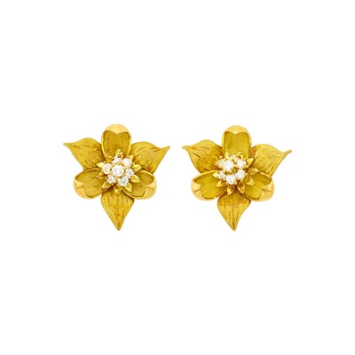 Lot 1214 - Tiffany & Co. Pair of Gold and Diamond 'Dogwood' Flower Earclips