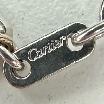 Lot 146 - Cartier White Gold, Platinum, Colored Stone and Diamond Yacht Flag Charm Bracelet