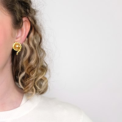 Lot 1142 - Angela Cummings for Assael Pair of Gold, Golden Cultured Pearl and Yellow Sapphire Earclips