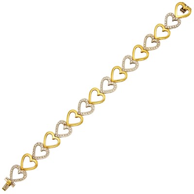 Lot 1035 - Two-Color Gold and Diamond Heart Link Bracelet