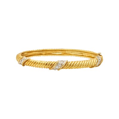 Lot 2065 - Two-Color Gold and Diamond Bangle Bracelet