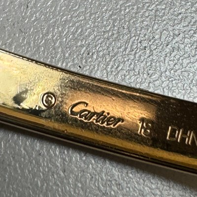 Lot 63 - Cartier Gold 'Love' Bangle Bracelet