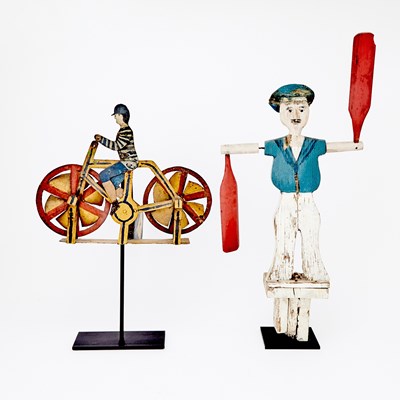 Lot 1064 - Painted Pine "Dewey Boy" Whirligig and a Painted Tin Bicycle and Rider Weathervane