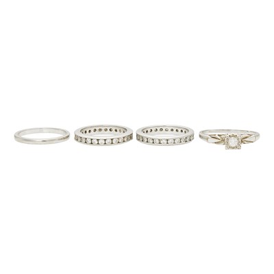 Lot 2220 - Two White Gold and Diamond Rings and Two Platinum and Diamond Band Rings