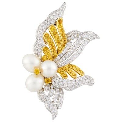 Lot 21 - Two-Color Gold, South Sea Cultured Pearl, Diamond and Yellow Sapphire Clip-Brooch